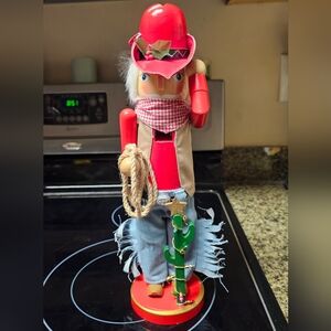 Brand New. Holiday Home Cowboy Santa Wood Nutcracker. Approx 15"